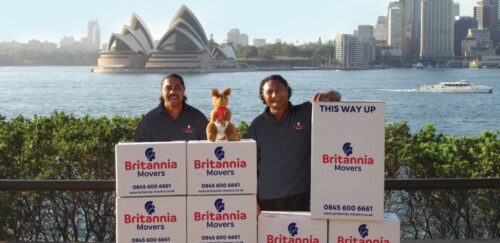 removals team and boxes in Australia near Sydney opera house