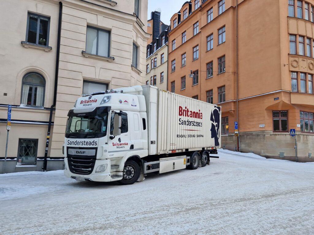 britannia-sandersteads-removal-vehicle-snow outside office buildings
