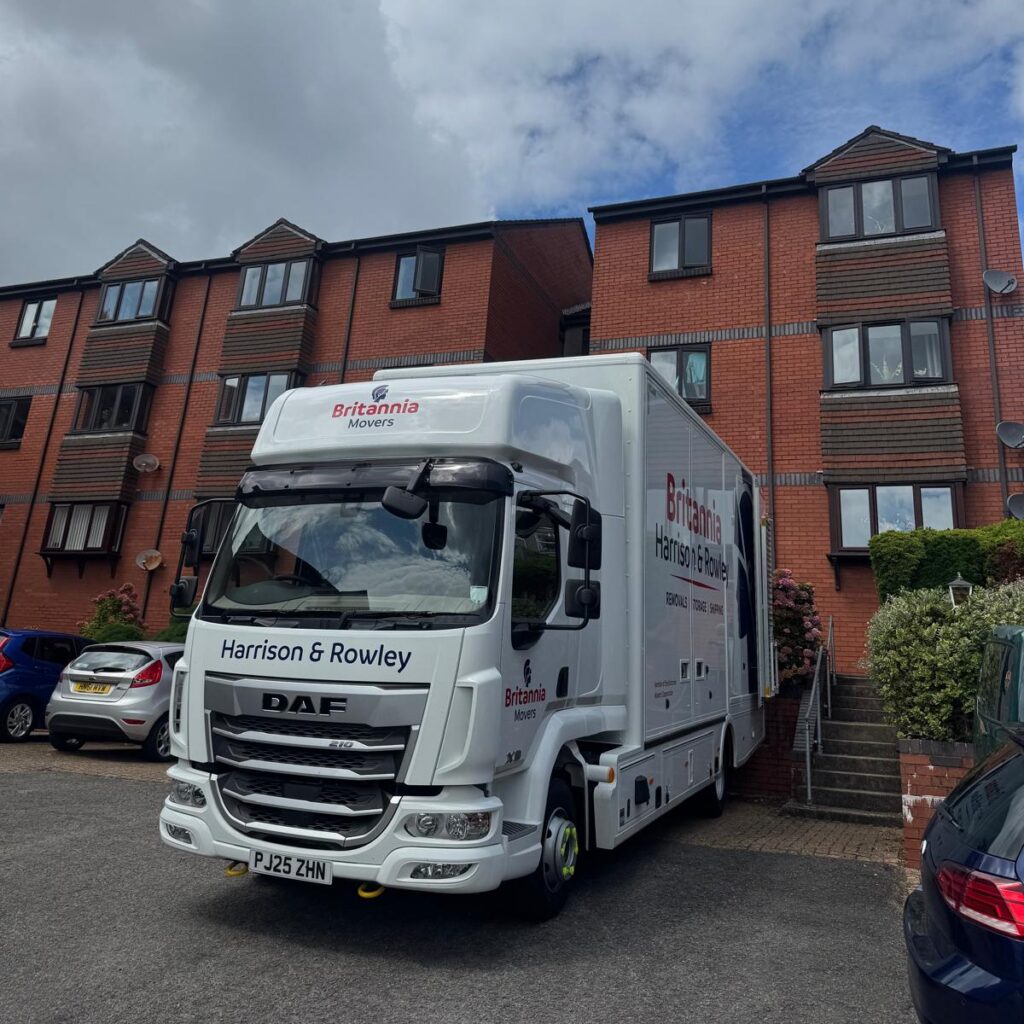 britannia harrison & rowley home removal vehicle outside flats